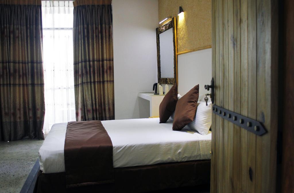The Tenth Hotel Ella Quarto foto